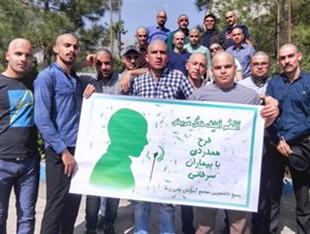 جمعی از دانشجویان زرندی موی سرخود را تراشیدند +عکس