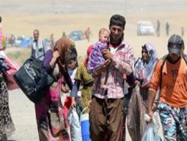 بازگشت ده ها آواره به محل زندگی خود در مرکز کشور عراق+ تصاویر
