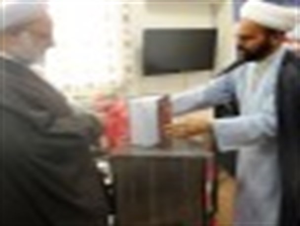 از کتابت آیات قرآن کریم در ایلام رونمایی شد