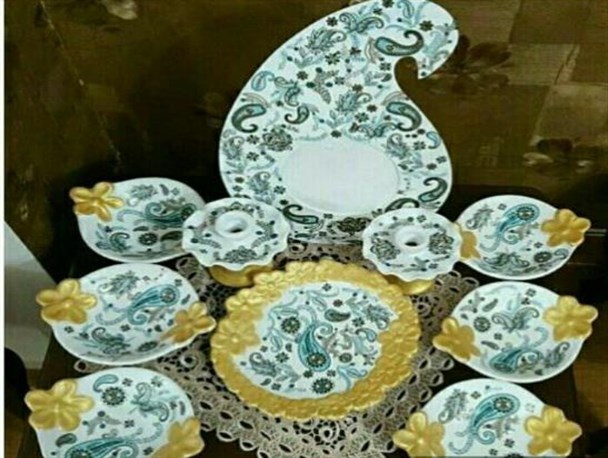 کسب درآمد و کارآفرینی از طریق هنر رنگ آمیزی و طراحی /  تنوع طرح و رنگ عامل گرایش مردم به هفت سین های  سفالی