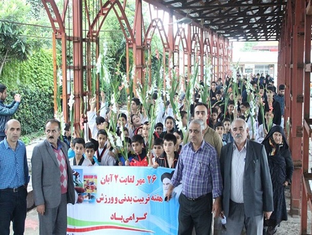 مراسم غبارروبی مزار شهدا با حضور ورزشکاران و مسئولان ورزشی چالوس