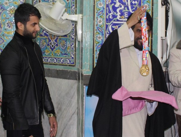 قهرمان پرس سینه جهان مدالش را به شهدای مدافع حرم تقدیم کرد + تصاویر