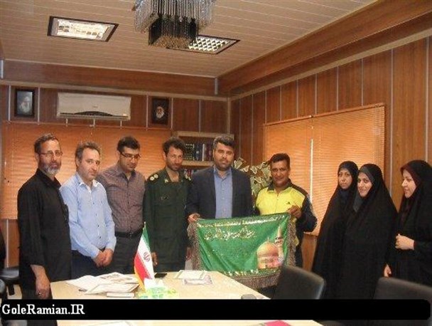 دوچرخه سوار حامل پرچم متبرک امام حسین(ع) به رامیان رسید+تصاویر