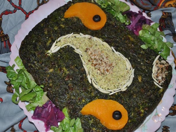 رقابت بانوان هنرمند میبدی در پخت ماهی+تصاویر