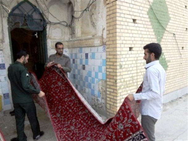 غبار روبی امامزاده بابا احمد بهمئی به مناسبت دهه کرامت +تصاویر